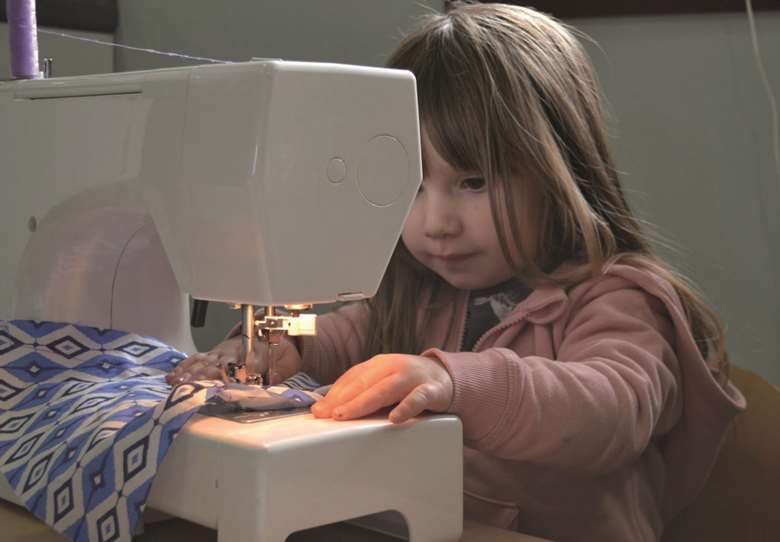 At Poppies Preschool, children learn to sew both by hand and using sewing machines