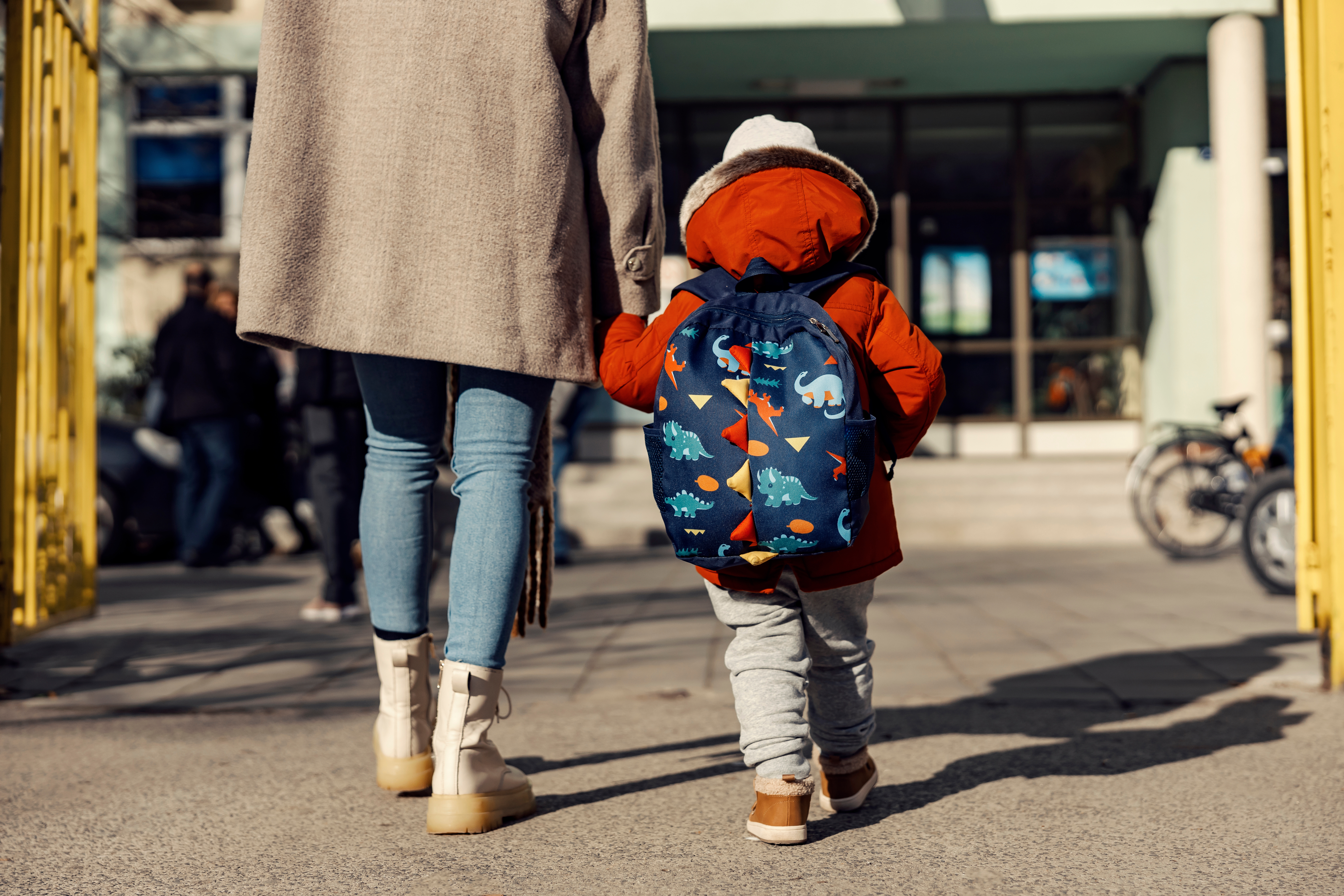 adobestock_488547171_mum-taking-child-to-nursery.jpeg