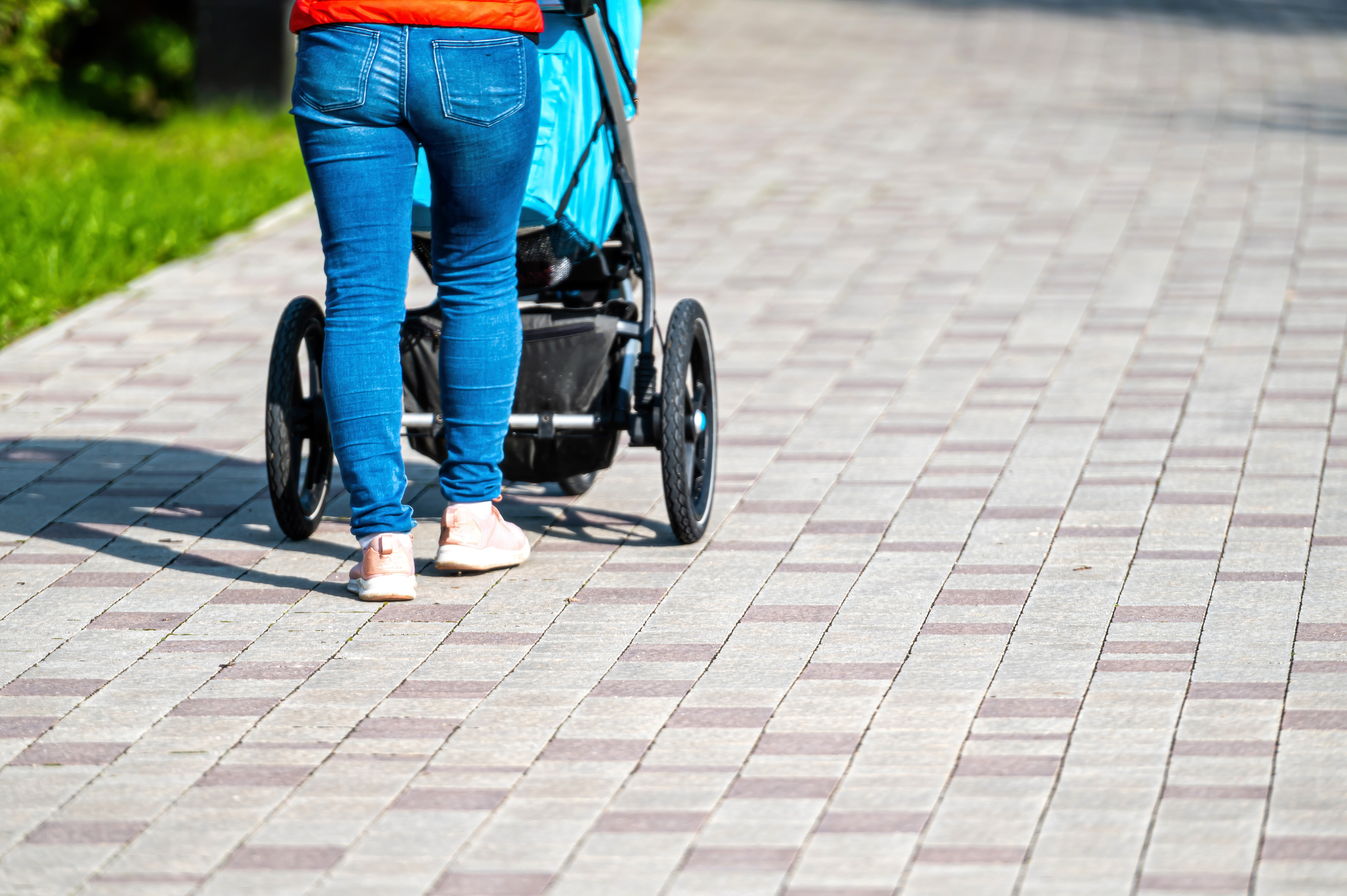 Adobestock 533934320. Mum Pushing Buggy