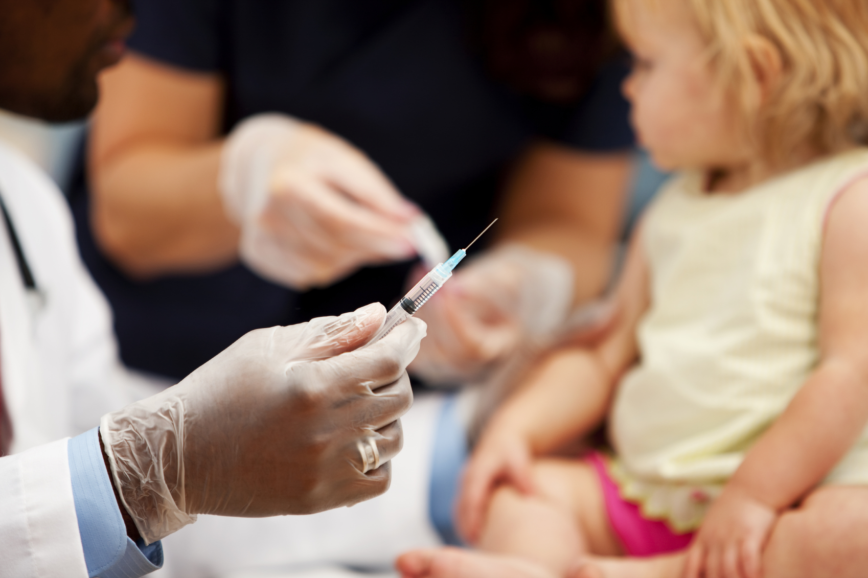 syringe-with-child-in-background.jpg