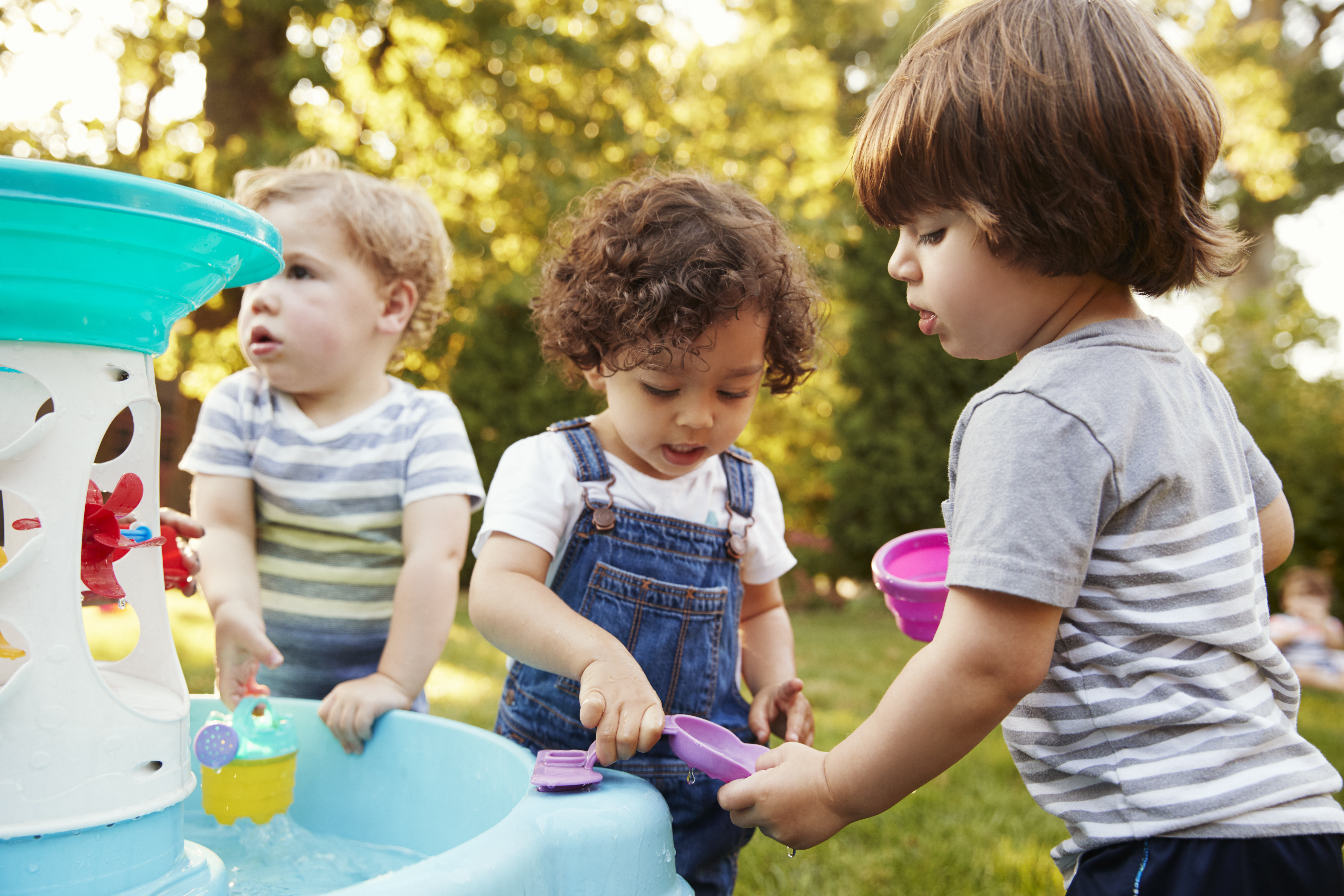 adobestock_188224414_childrne-playing-with-water-table.jpeg