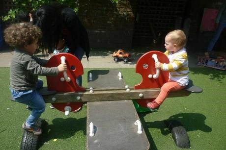 children-on-a-seesaw