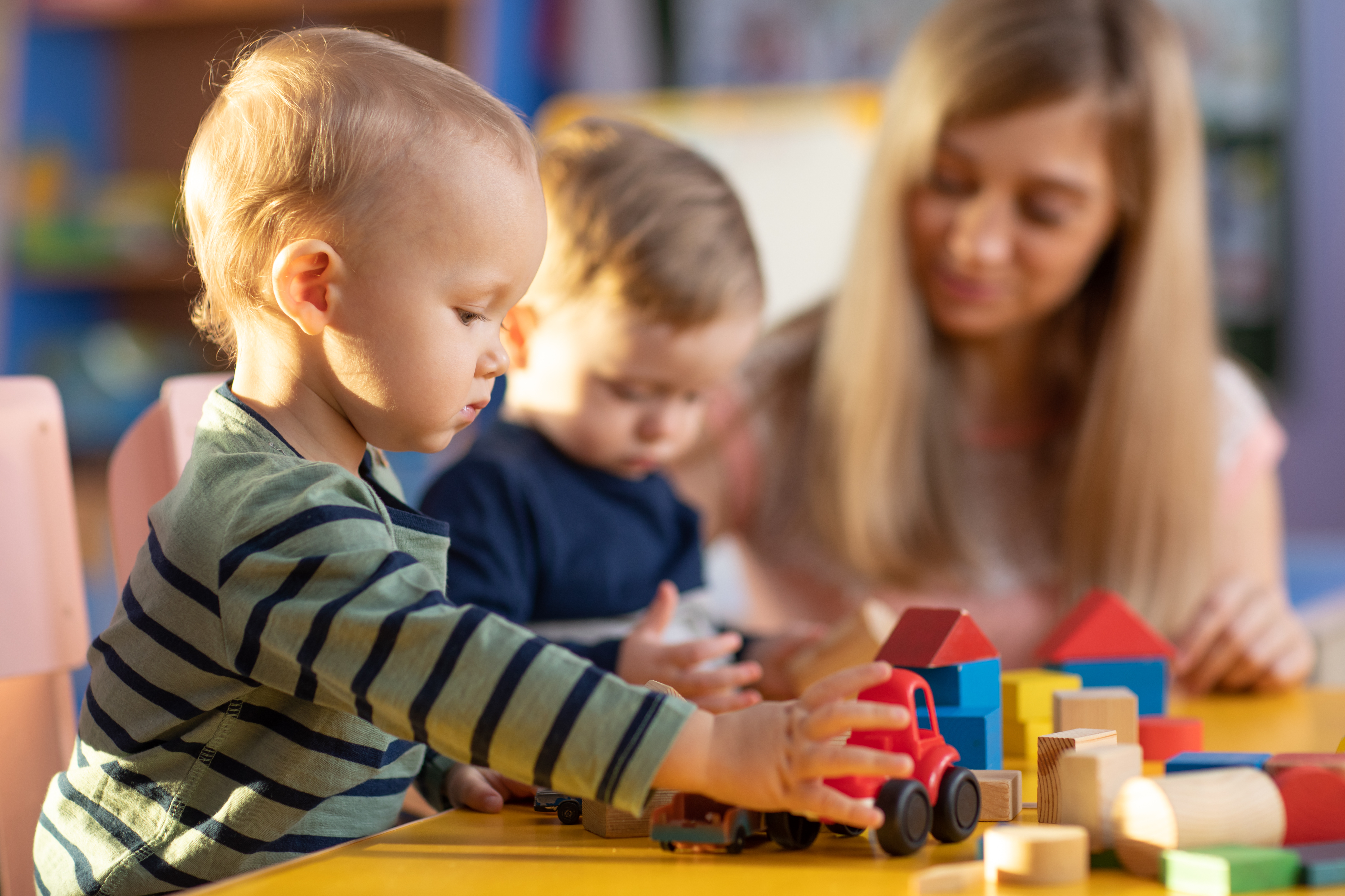 nursery-boy-playing-with-car.jpeg