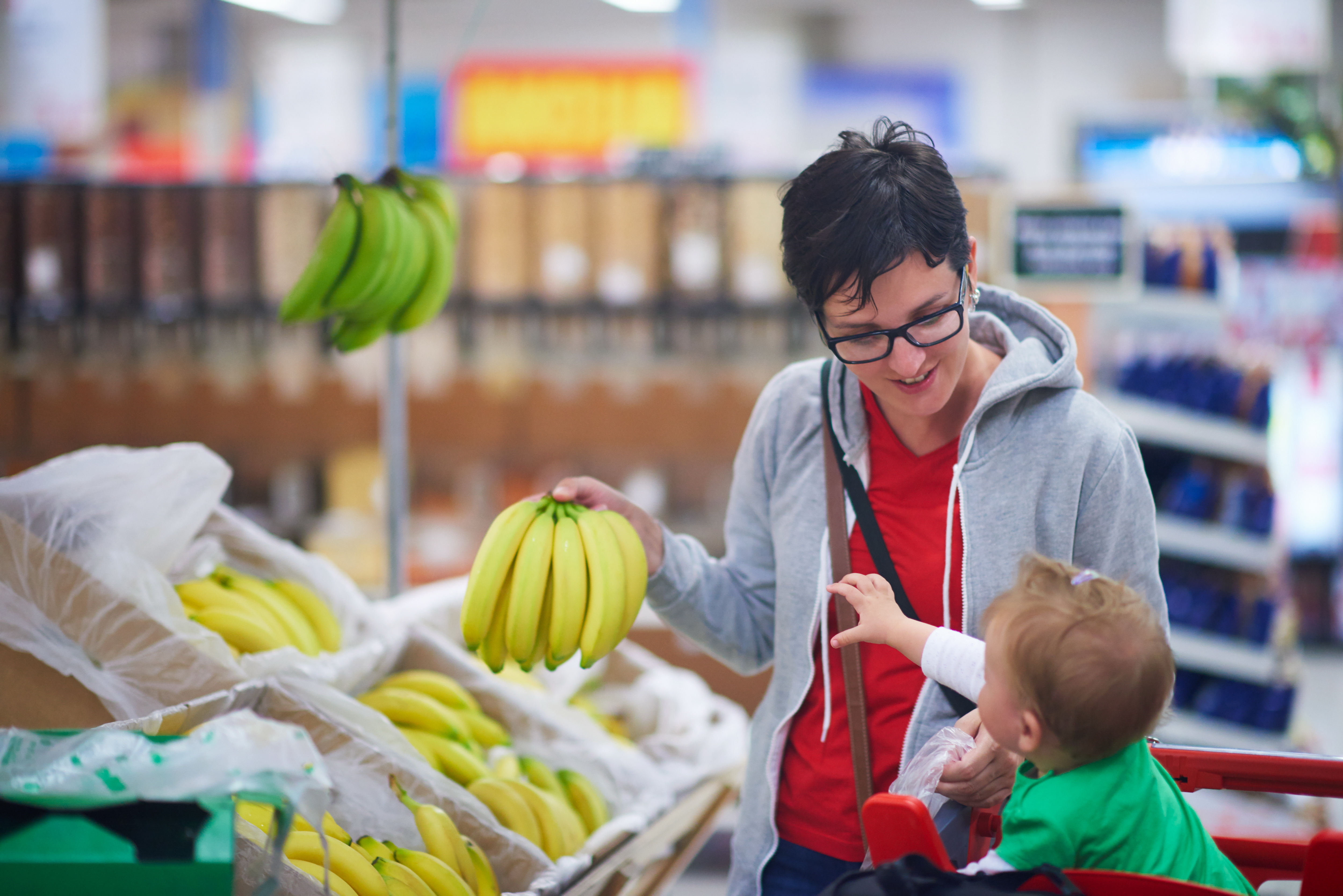 mum-buying-bananas-with-baby.jpeg