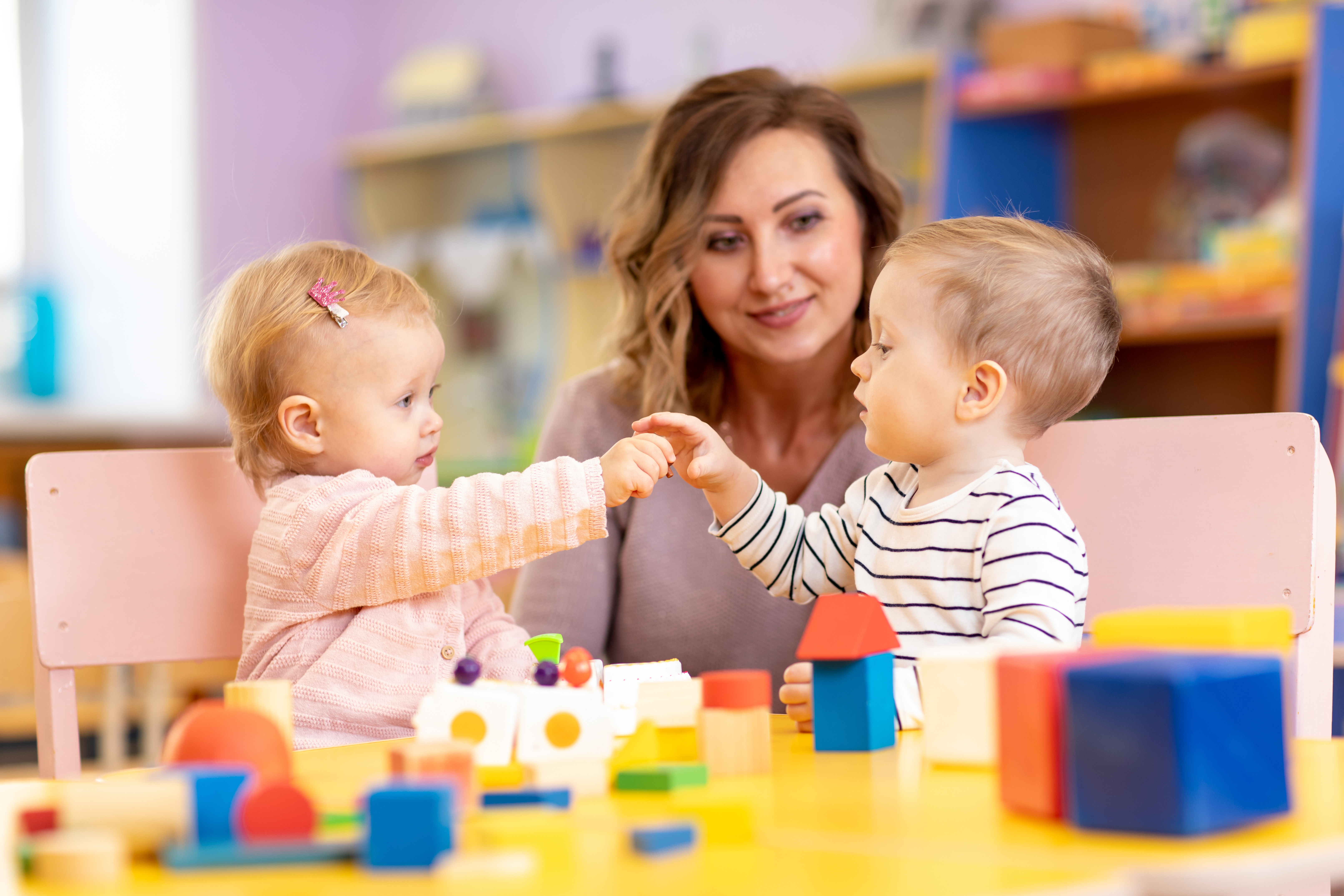 adobestock_243625143-nursery-teacher-toddlers.jpeg