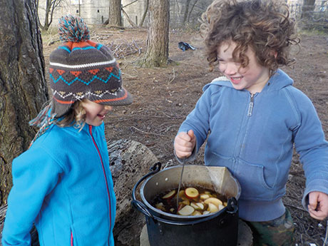 making-spied-fruit-punch-to-warm-on-the-fire.jpg