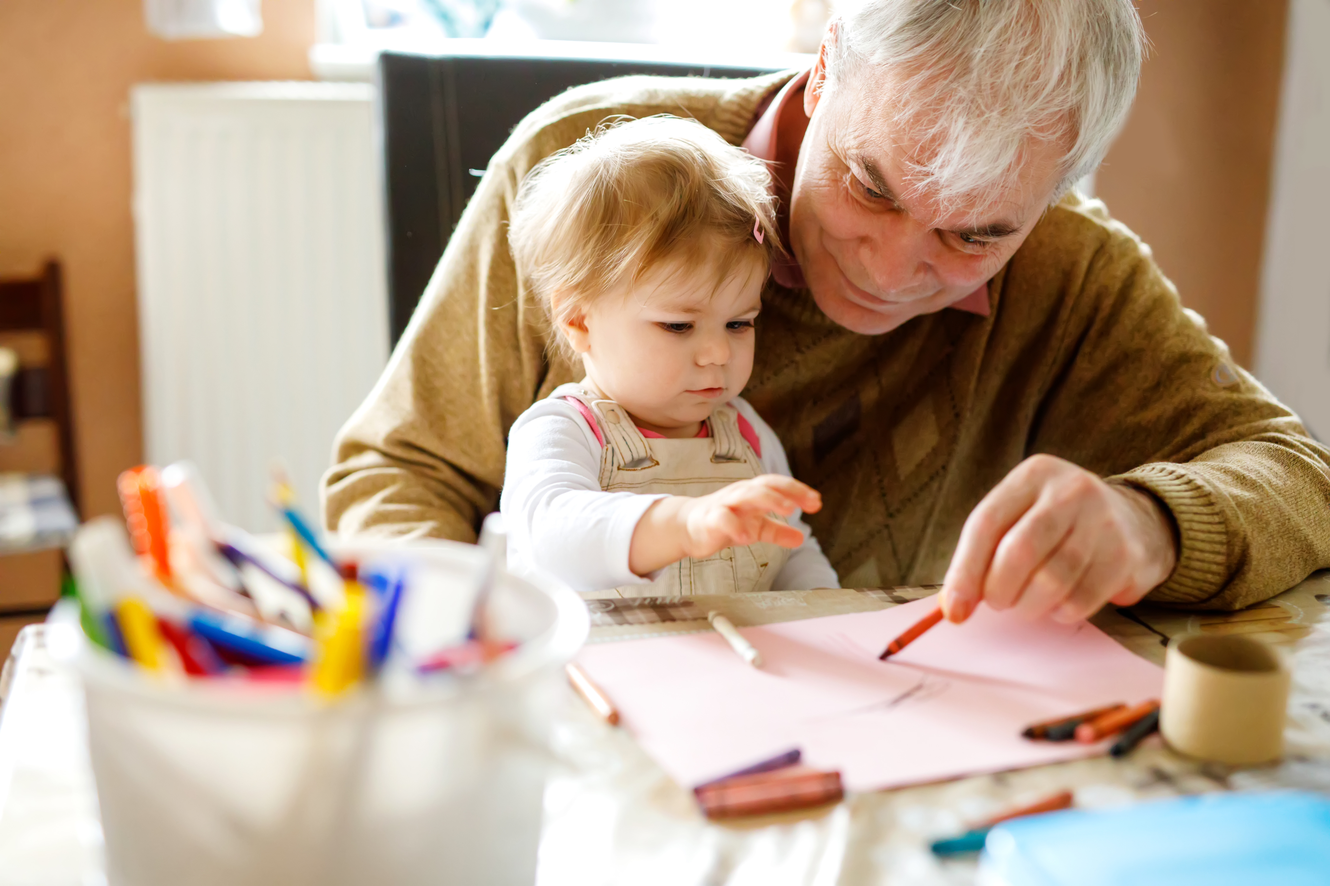 adobestock_195986054_grandfather-drawing-with-toddler.jpeg