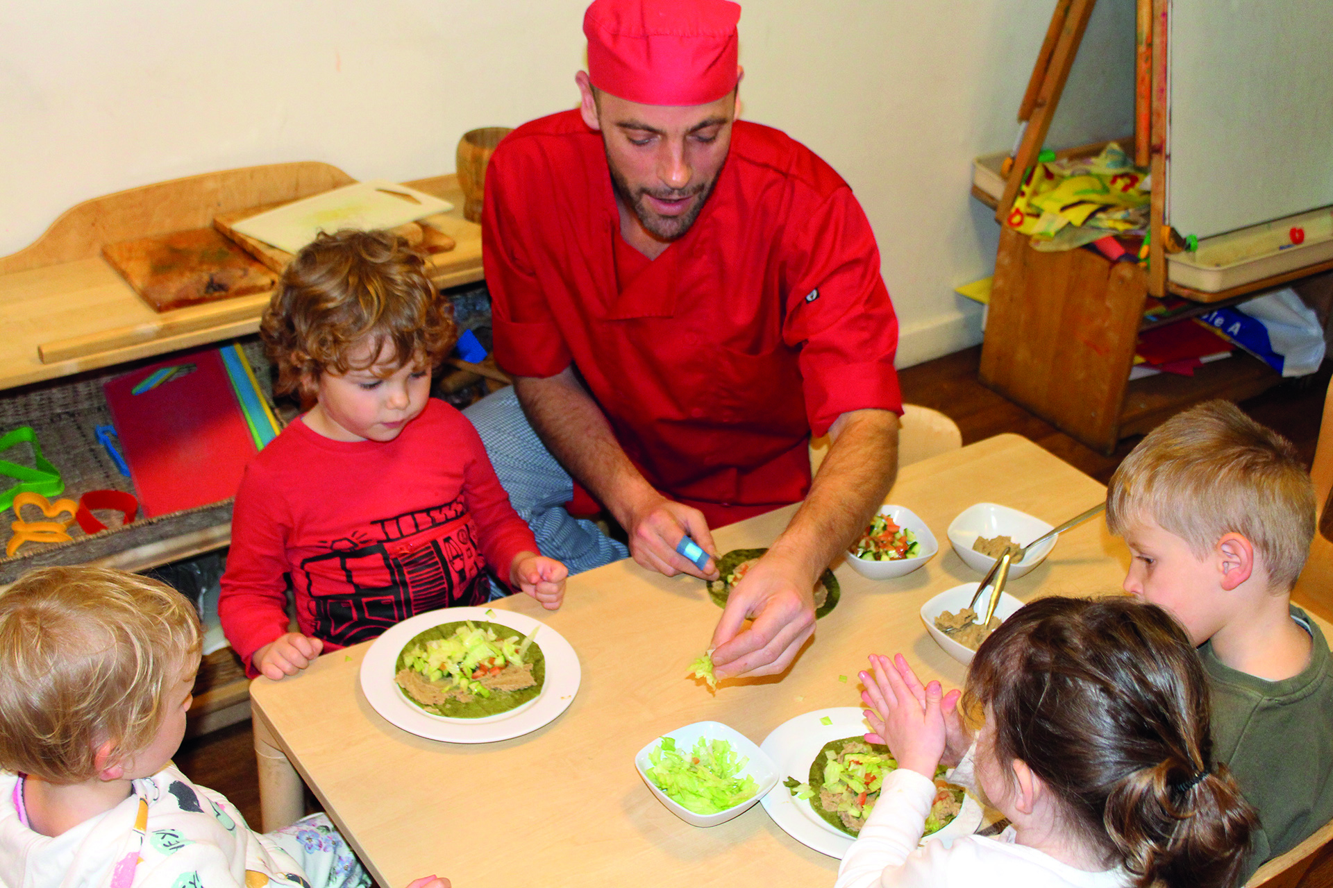 chef-yannick-verrier-making-veggie-wraps-with-children-at-portland-nurseries.jpg