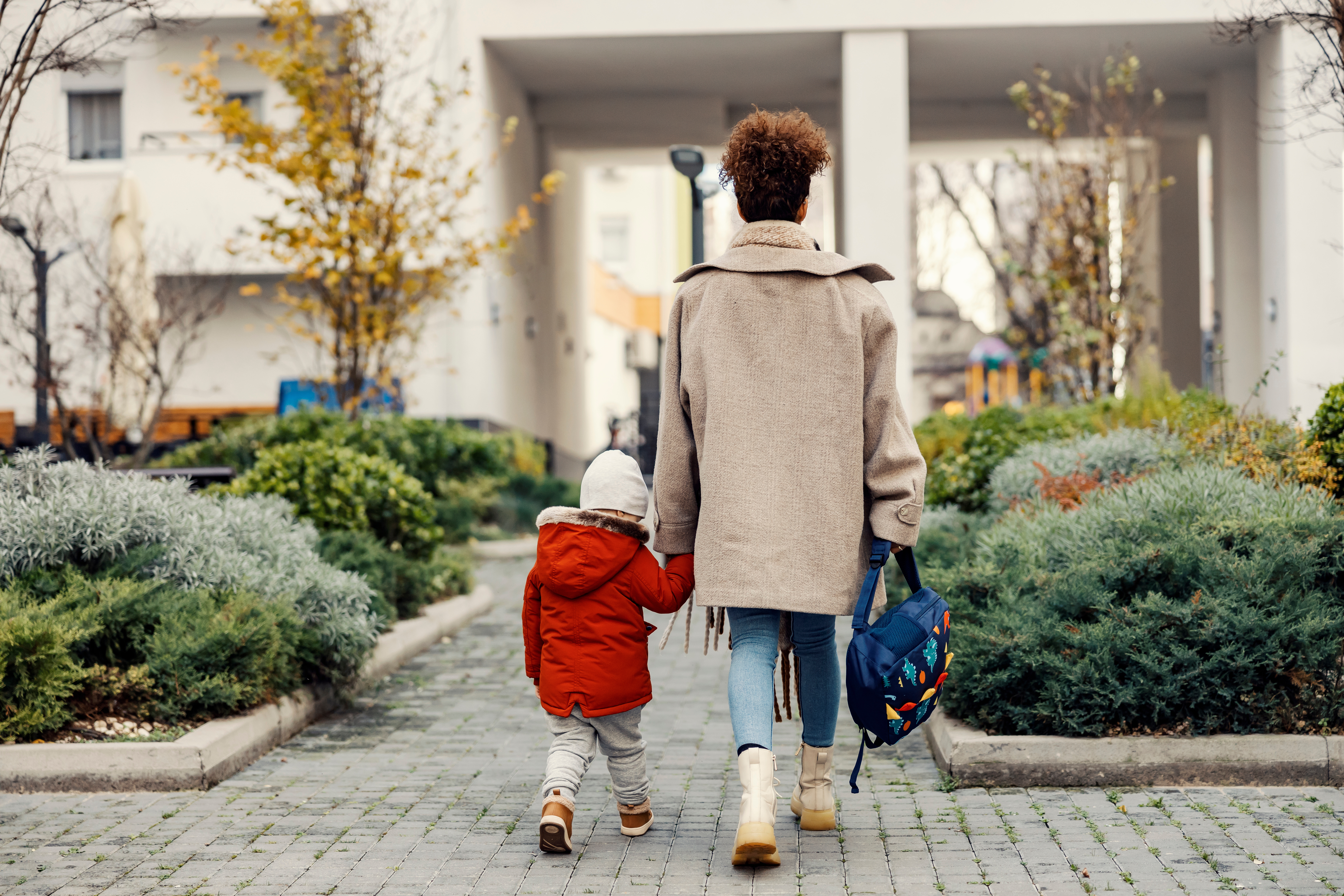 main-image-mum-dropping-child-off-at-kindergarten_adobestock_488547086.jpeg