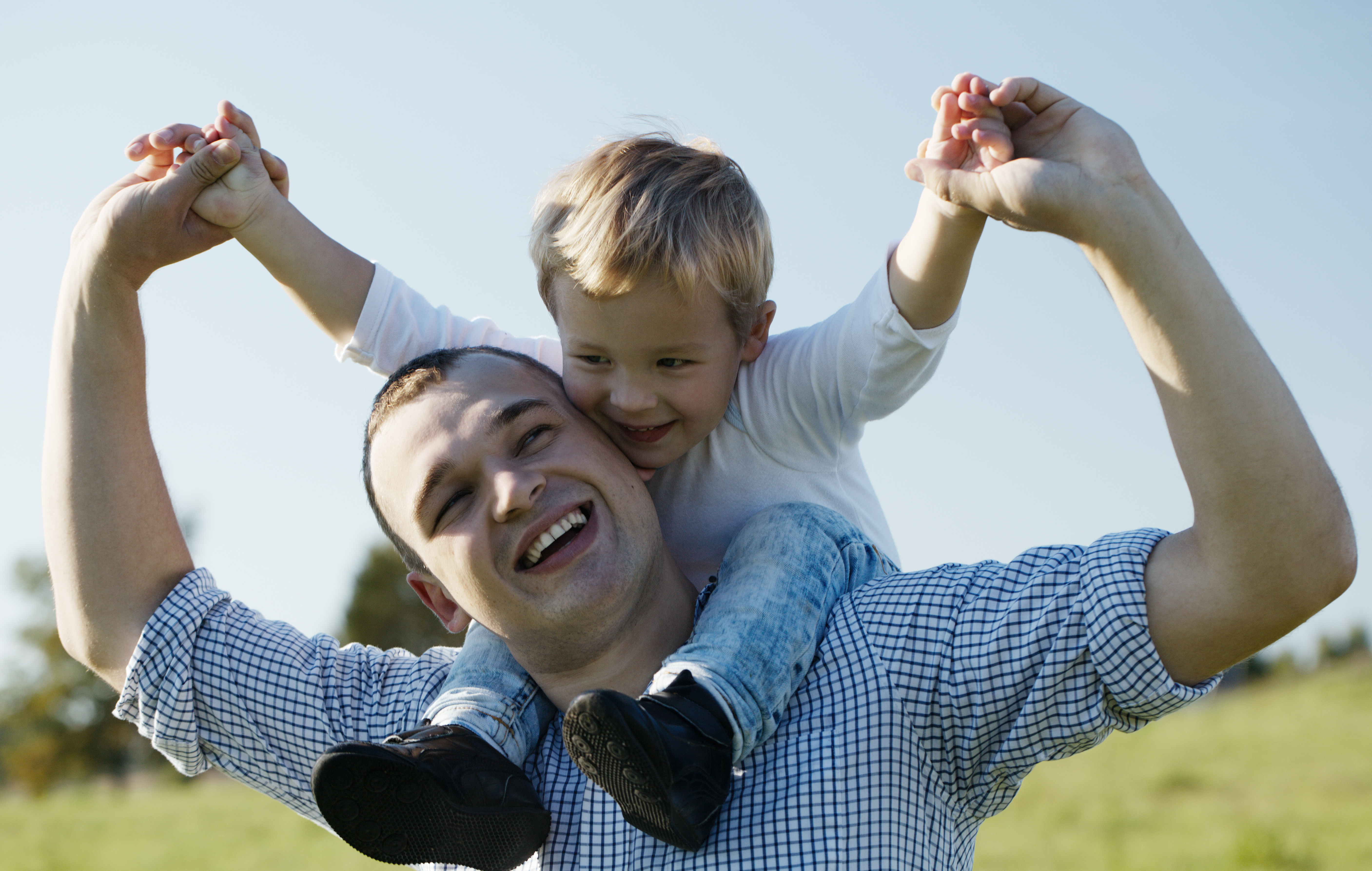 dad-giving-son-a-piggy-back.jpeg