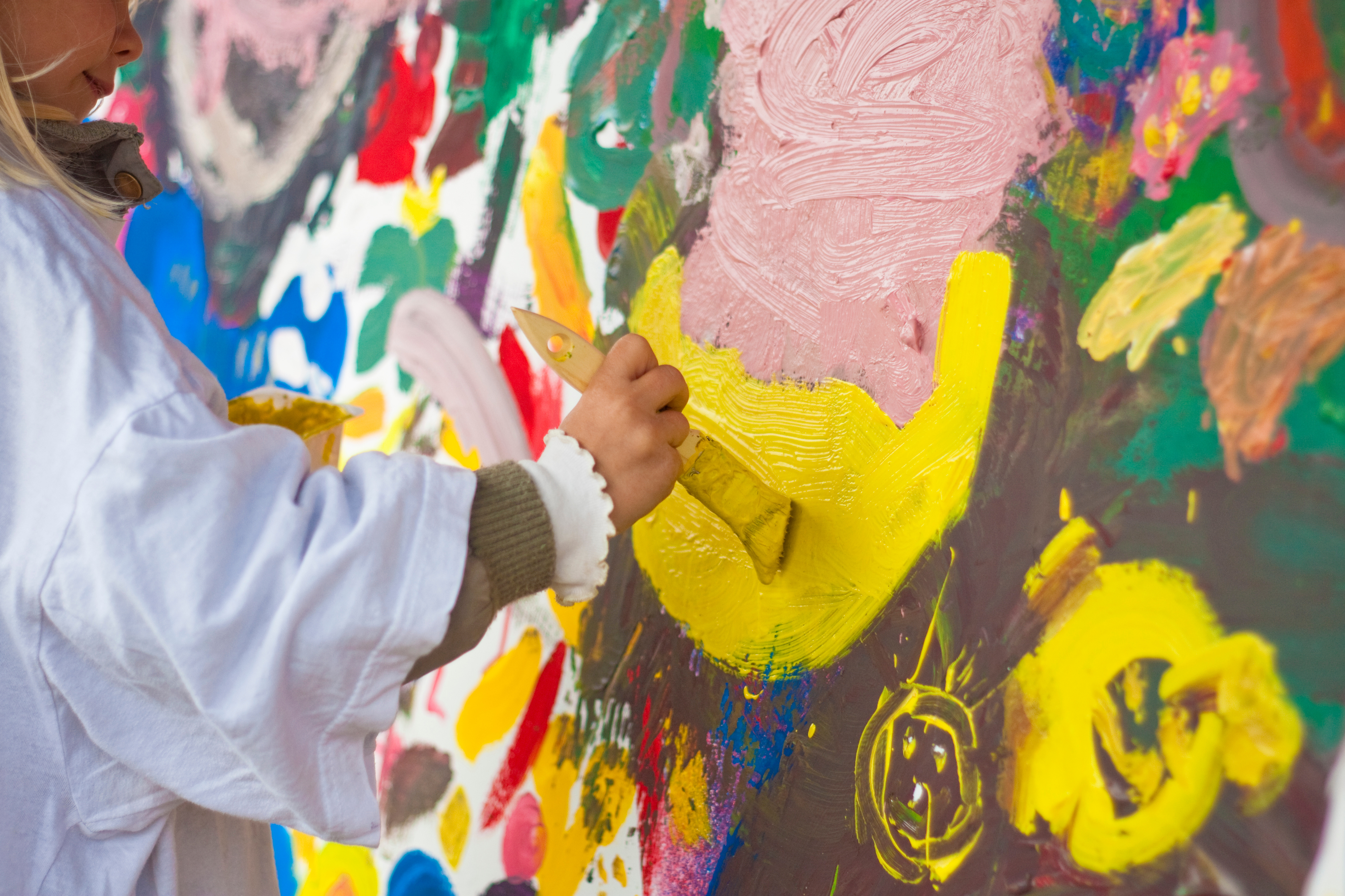 adobestock_14620994-_child-painting-on-a-wall.jpeg