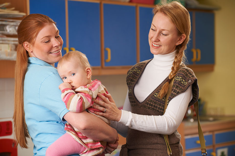 nursery-worker-with-mum-and-child.jpg