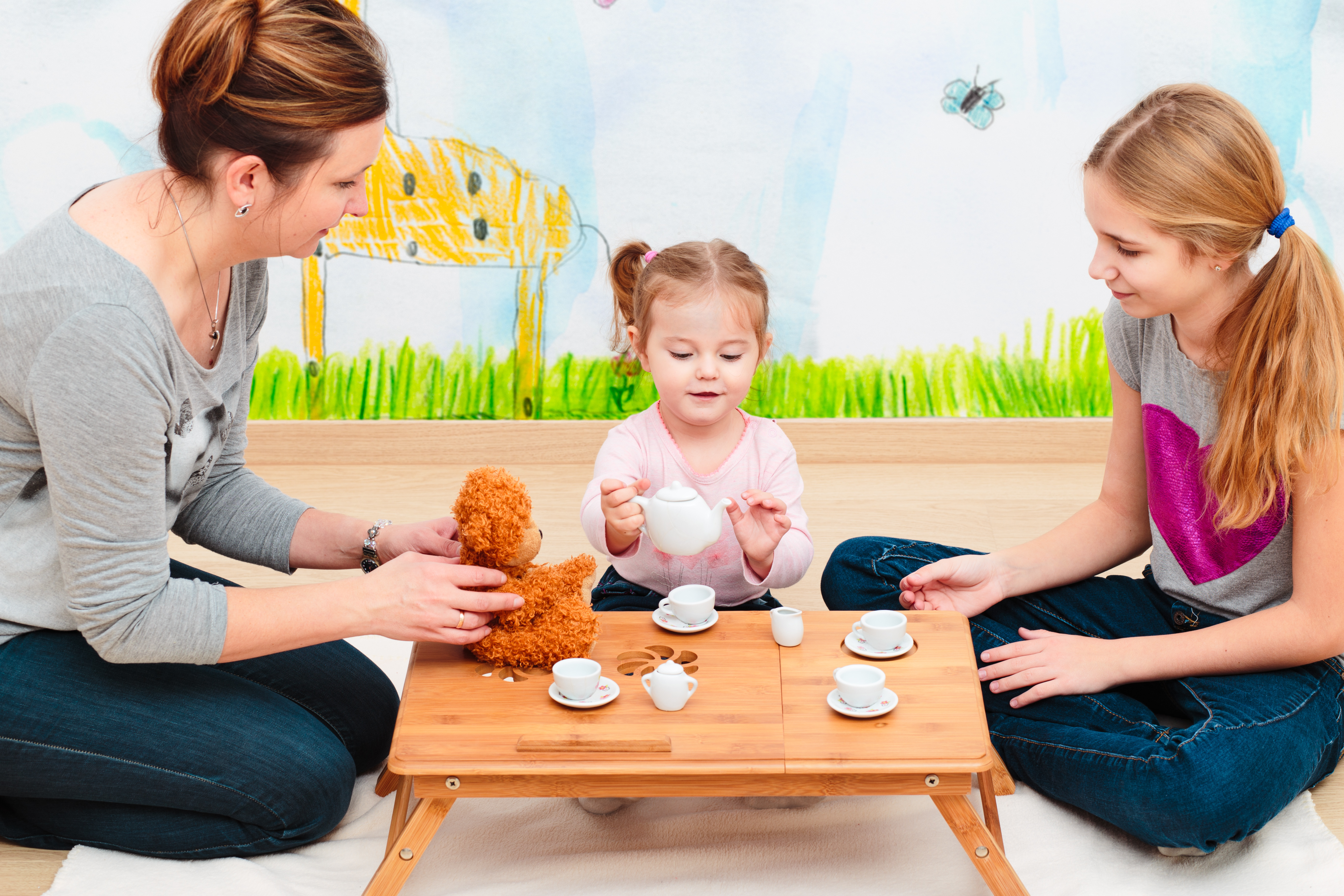 adobestock_126003080_mum-and-sister-playing-tea-party.jpeg