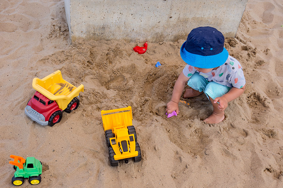 toddler-boy-playing-in-sand.jpg