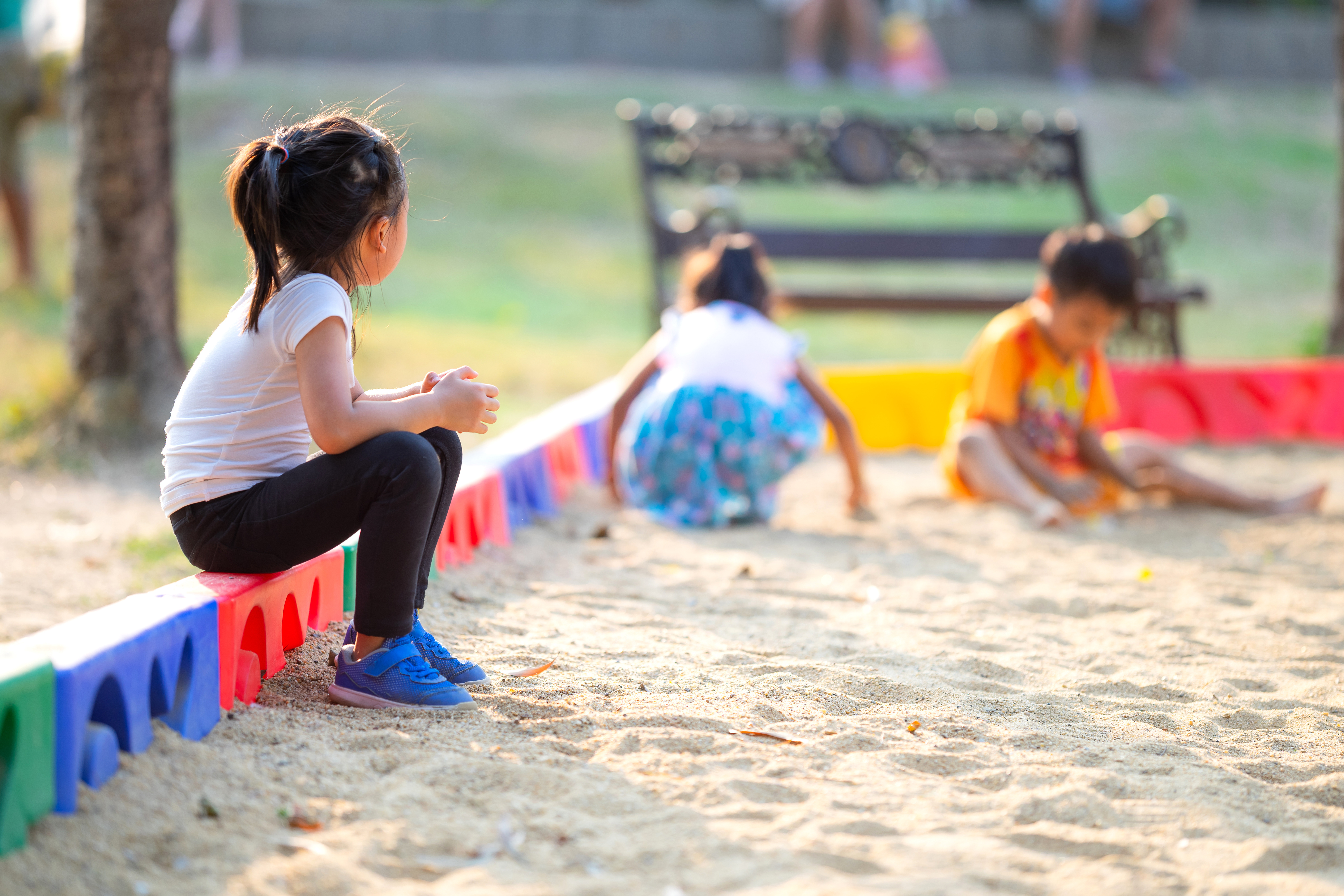 lonely-girl-in-sandpit.jpeg