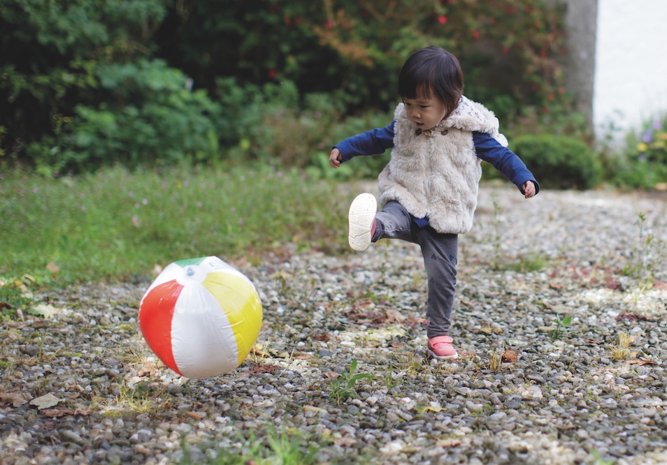 girl-kicking-ball.jpeg