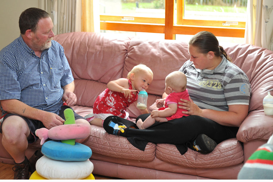 home-start-volunteer-with-family-on-settee.jpg